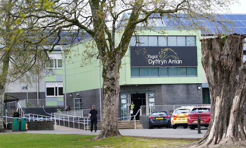 Police at Amman Valley school in Ammanford, Carmarthenshire following the incident