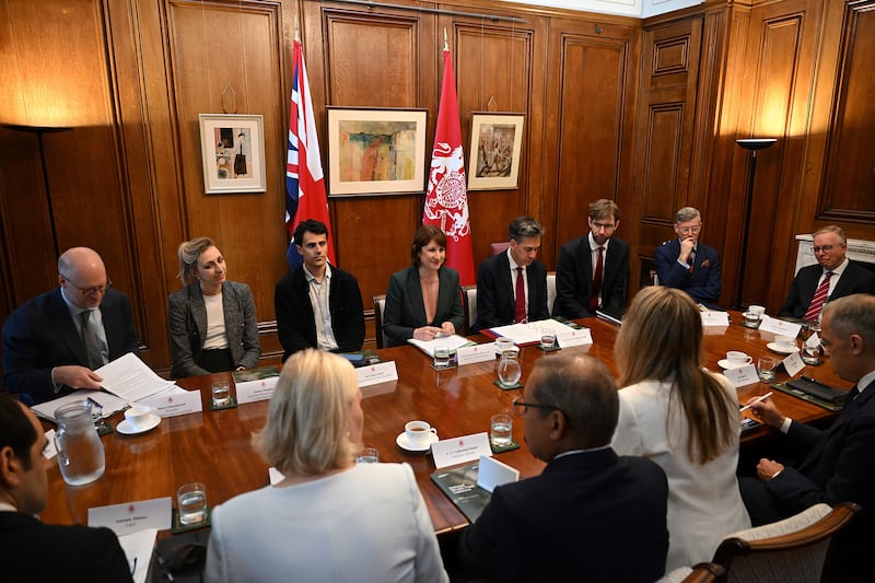 Chancellor of the Exchequer Rachel Reeves (centre) with her special adviser Neil Amin-Smith (centre left) with Energy Security and Net Zero Secretary Ed Miliband (centre right) at the announcement of the establishment of the National Wealth Fund