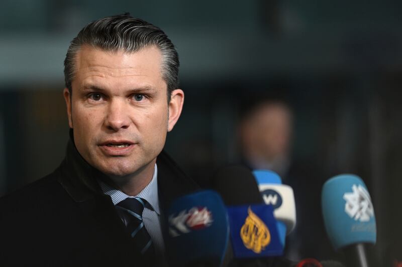 US secretary of defence Pete Hegseth speaks with the media as he arrives for a meeting at Nato headquarters in Brussels (Harry Nakos/AP)