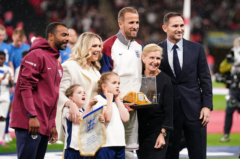 Kane was presented with a golden cap before the game