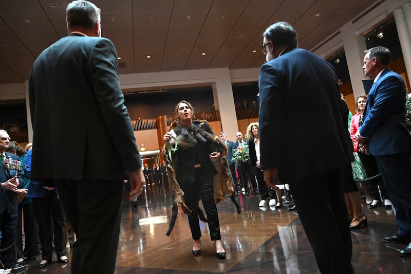 Australian Senator Lidia Thorpe, centre, disrupts proceedings as King Charles and Queen Camilla attend a Parliamentary reception hosted by Australian Prime Minister Anthony Albanese and partner Jodie Jaydon (Lukas Coch/AP)