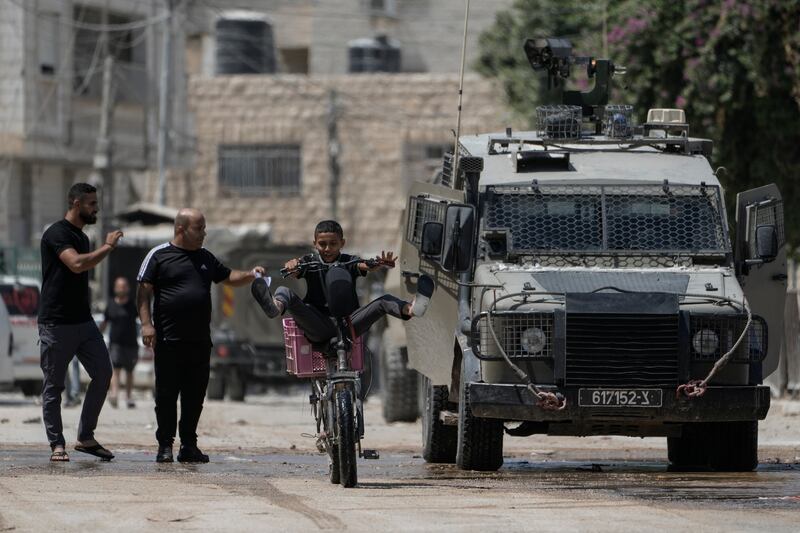 The governor of Jenin, Kamal Abu al-Rub, said on Palestinian radio that Israeli forces had surrounded the city (AP)