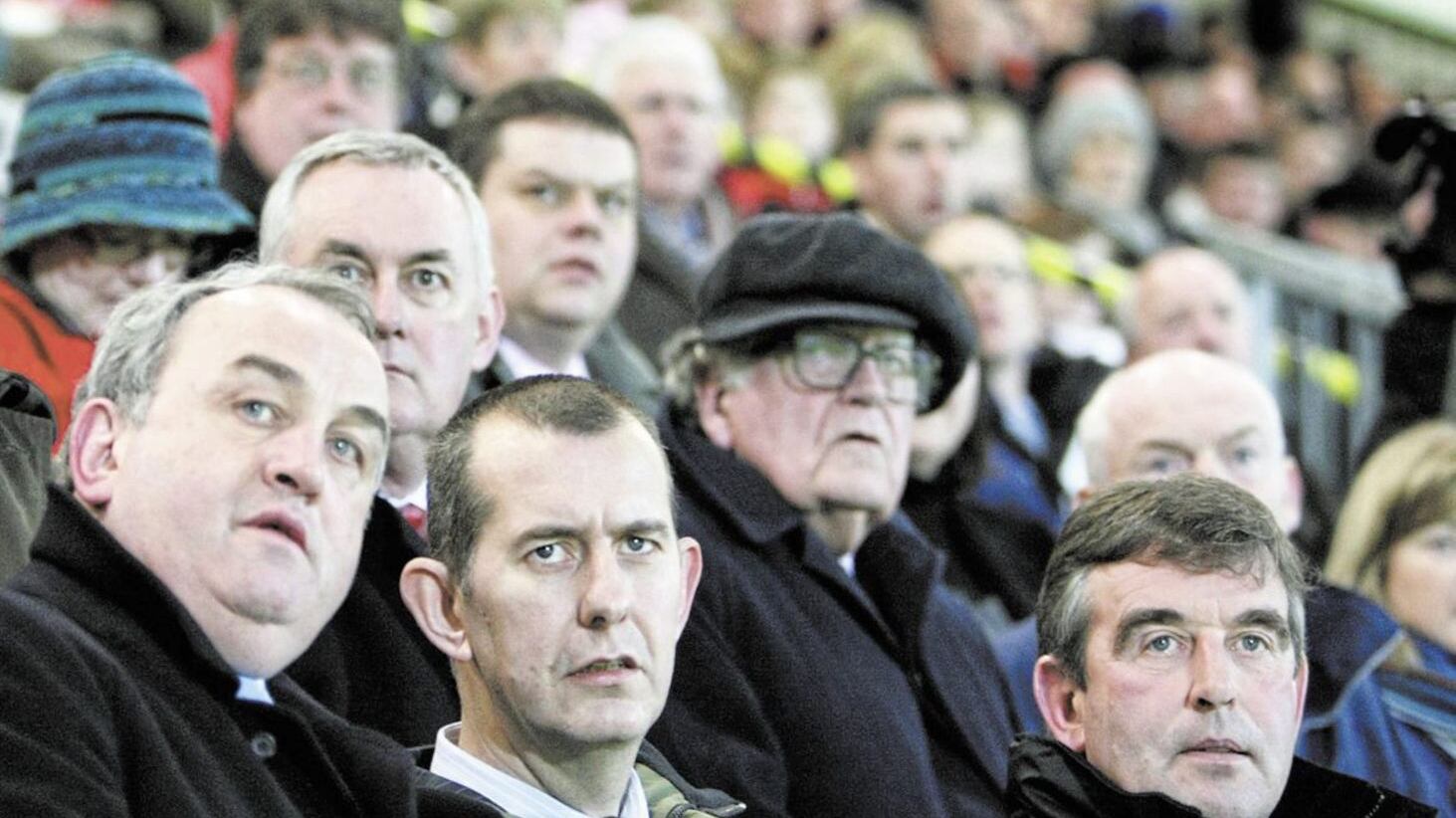 Sports minster Edwin Poots, GAA president Nicky Brennan and Ulster GAA president Tom Daly in the stand looking goalward at Pairc Esler in Newry for the Donegal v Down game in 2008 