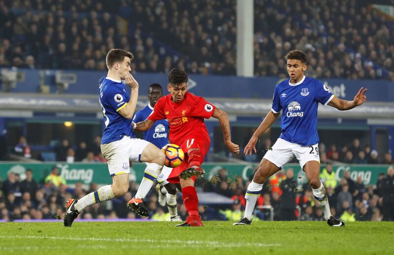 Seamus Coleman (left) in action for Everton in a Merseyside derby against arch-rivals Liverpool.