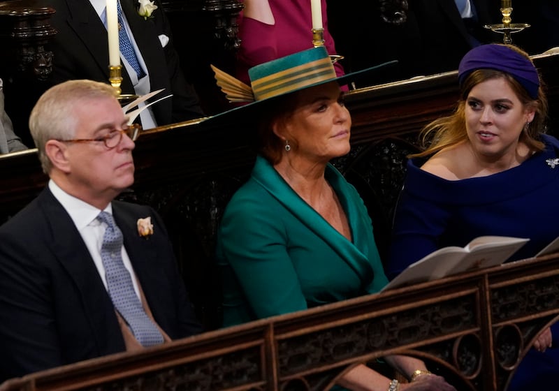 Beatrice with her parents the Duke of York and Sarah, Duchess of York at Eugenie’s wedding in 2018