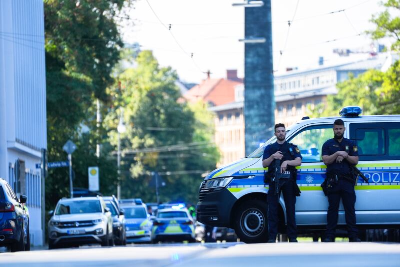 Police officers block a street after the incident in Munich (Matthias Schrader/AP)