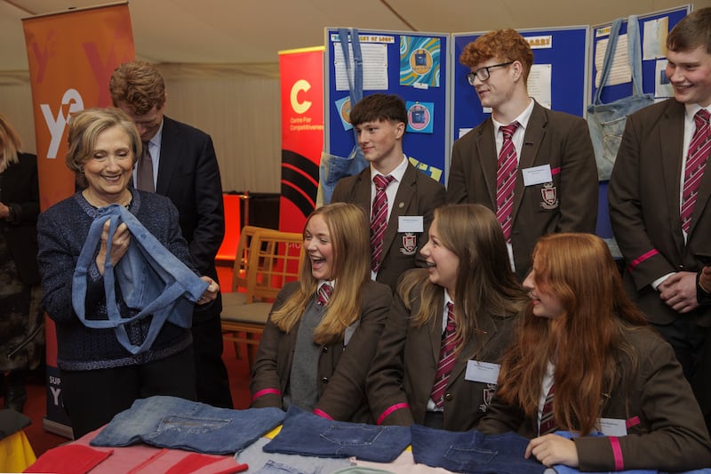 Hillary Clinton, left, met students from the Royal School Dungannon during her visit to Northern Ireland