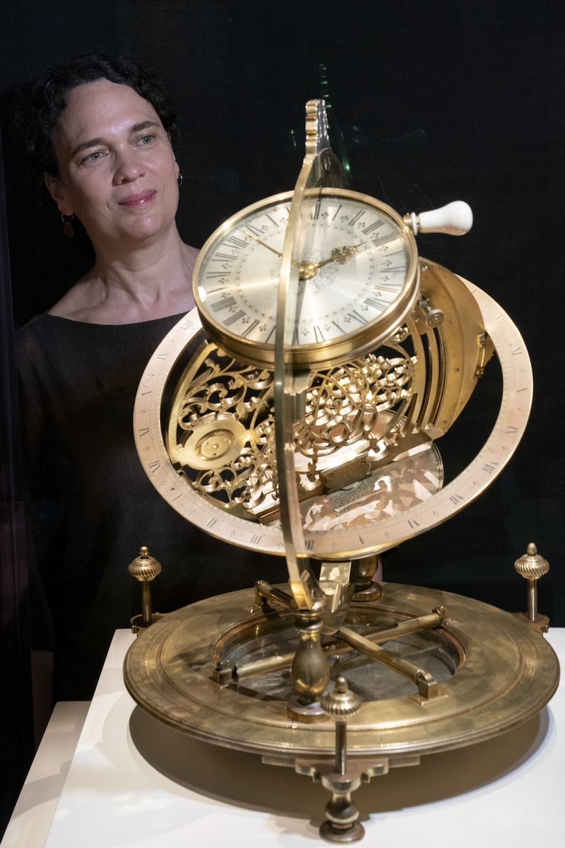 Principal curator of science Rebekah Higgitt alongside the Ilay Glynne sundial