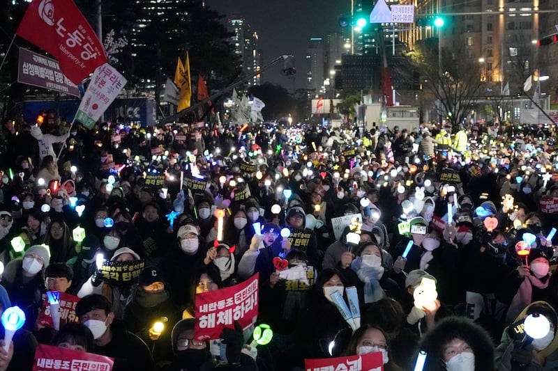 A rally demanding South Korean President Yoon Suk Yeol’s impeachment, outside the National Assembly in Seoul (Ahnn Young-joon/AP)