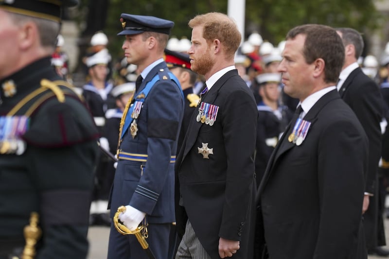The Prince of Wales, the Duke of Sussex and Peter Phillips following Queen Elizabeth II’s coffin on the day of her funeral
