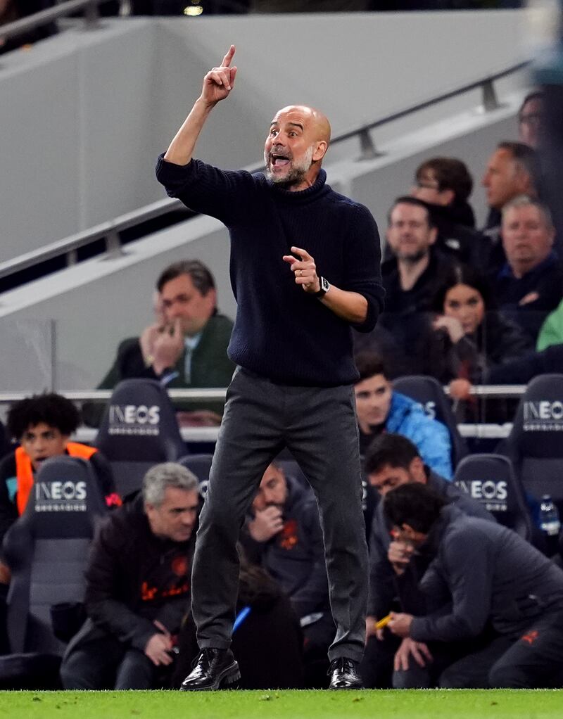 Pep Guardiola shouts instructions from the touchline