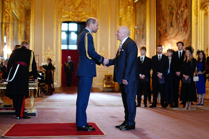 Ally McCoist received his OBE from the Prince of Wales during an investiture ceremony at Windsor Castle