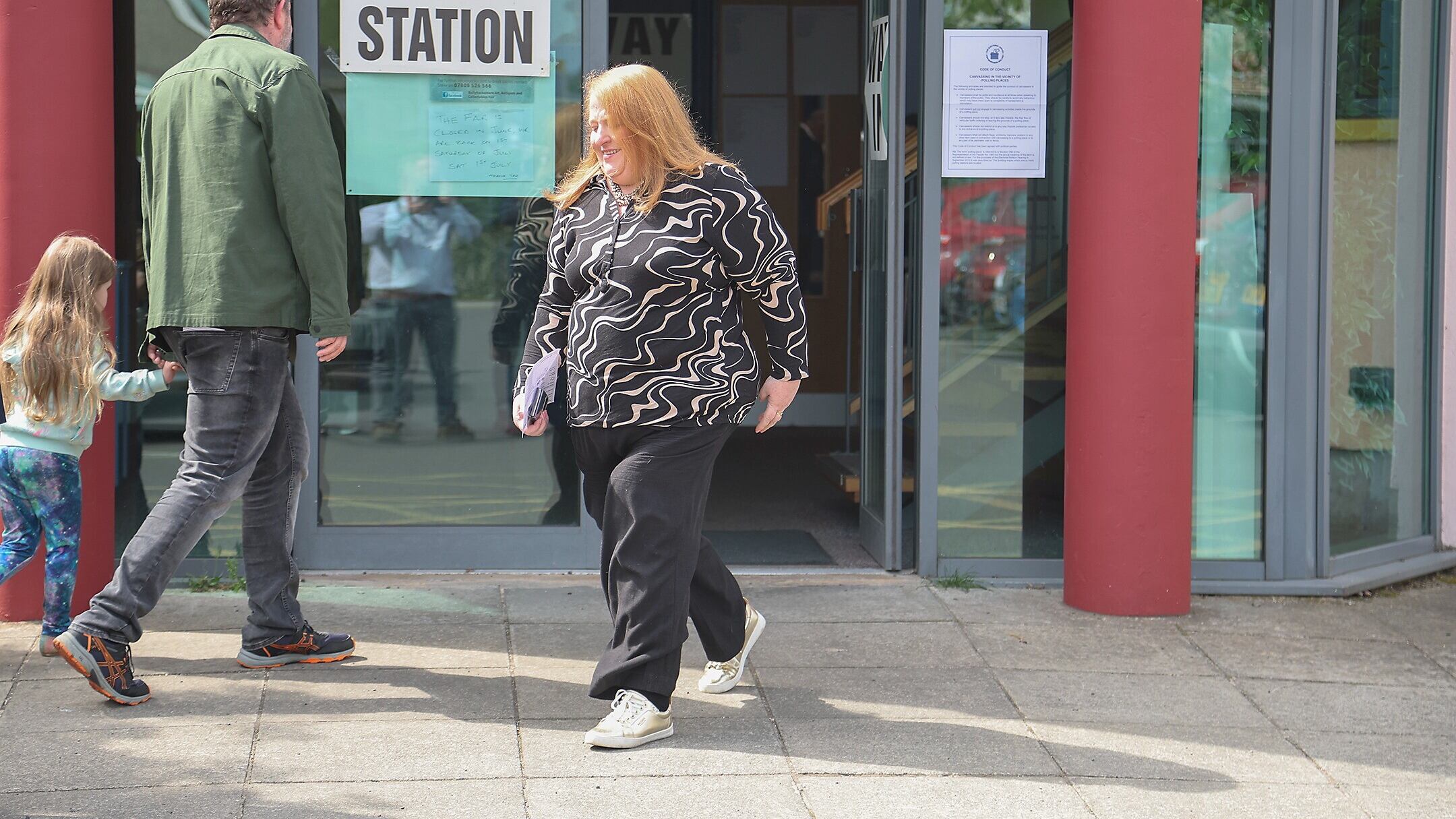 Naomi Long on the way into the polling station to vote.Picture by Hugh Russell