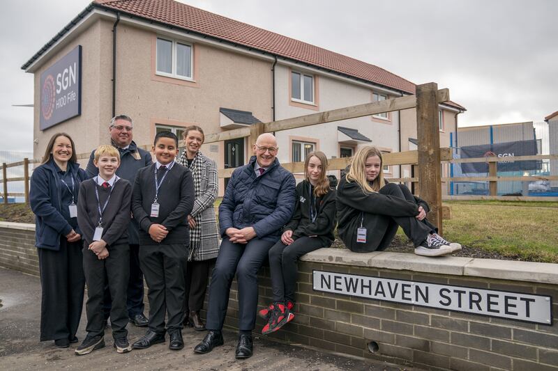 John Swinney met primary school students on the visit