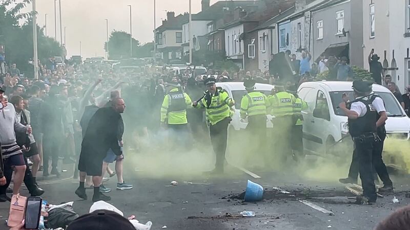 Clashes between protesters and the police flared on Tuesday in Southport