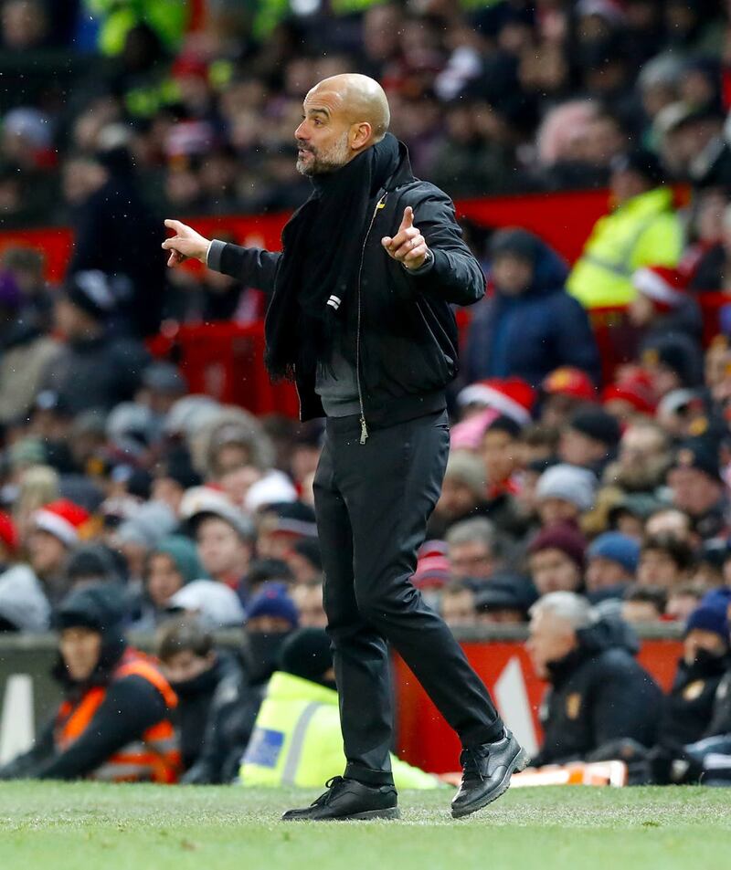 Manchester City manager Pep Guardiola on the touchline at Old Trafford