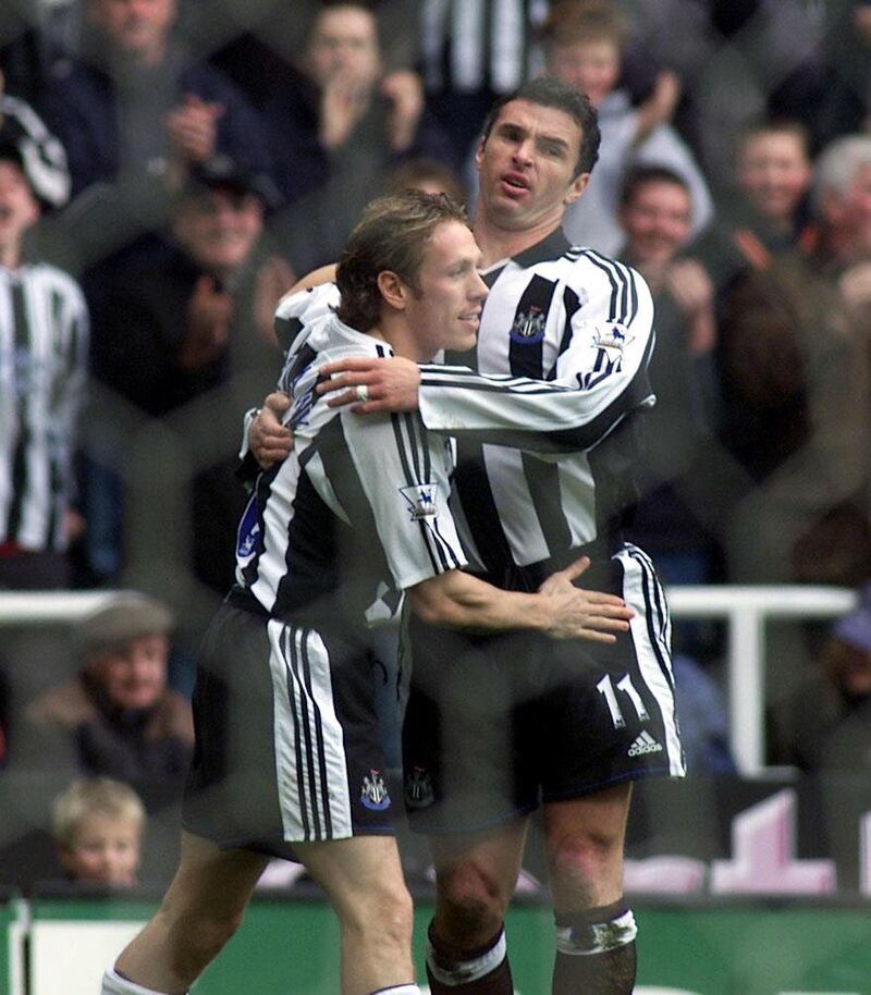 Craig Bellamy (left) of Newcastle celebrates his goal against Everton with team-mate Gary Speed