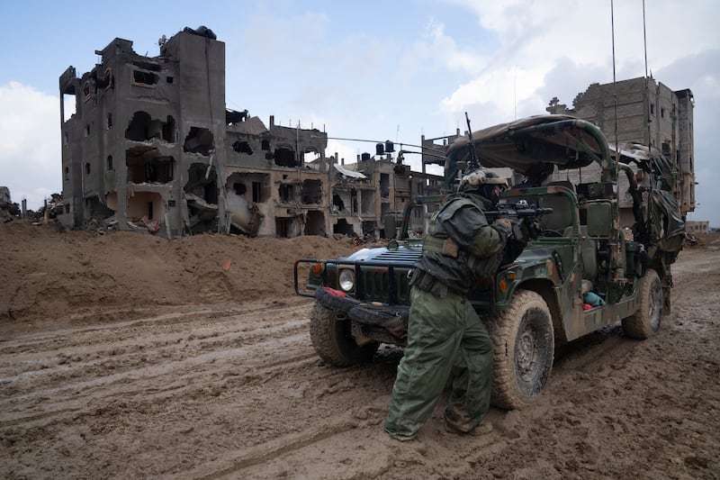 Israeli troops in Khan Younis (Sam McNeil/AP)