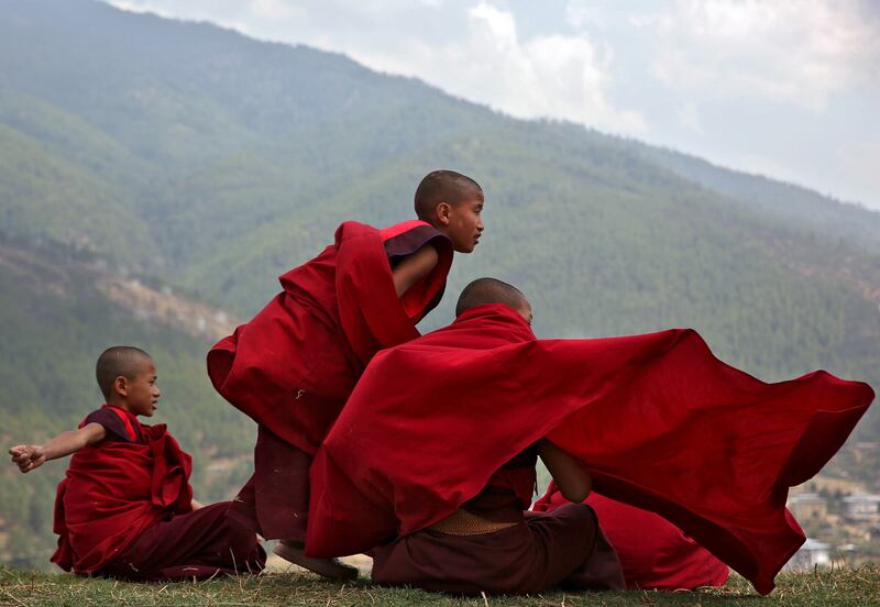 Young monks take a break from their studies at Changangkha Lhakhang temple in Thimphu, 2016. Picture by Cathal McNaughton