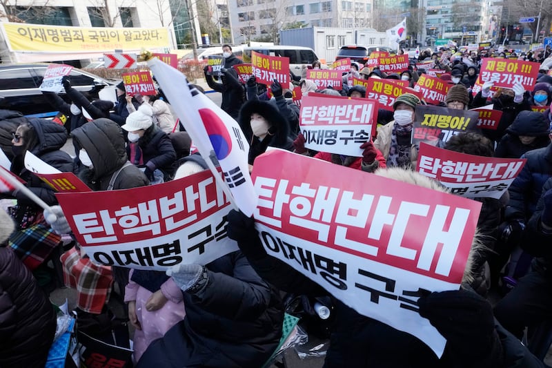 Supporters for impeached South Korean President Yoon Suk Yeol stage a rally against his impeachment near the Seoul Central District Court in Seoul, South Korea (AP/Ahn Young-joon)