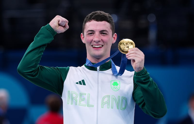 Ireland’s Rhys McClenaghan receives his gold medal during the ceremony for the Men’s Pommel Horse Final