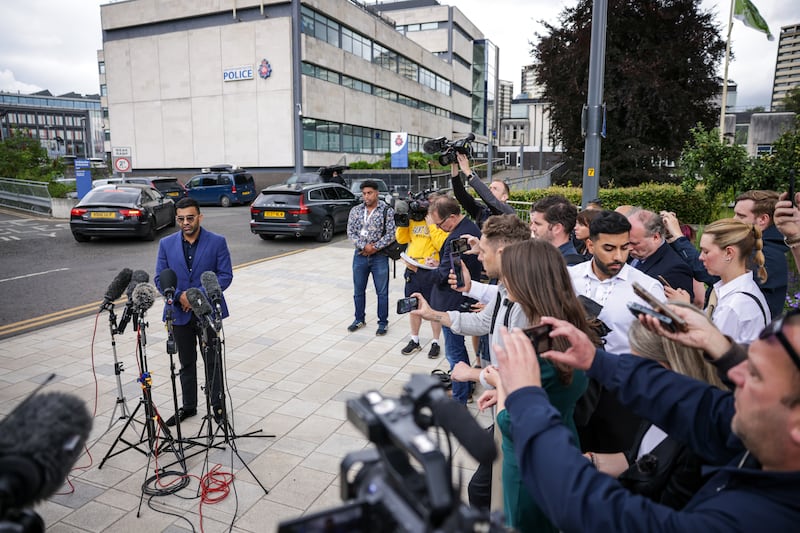 Solicitor Akhmed Yakoob speaks to the media outside Rochdale police station in Greater Manchester