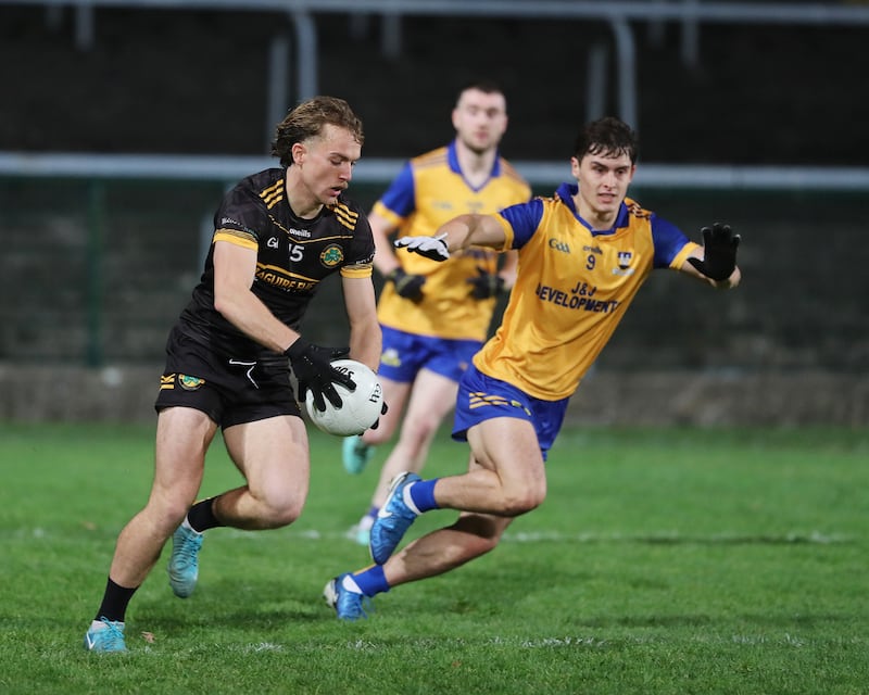 Ultan Kelm of Erne Gaels attempts to get past Johnny Cassidy of Enniskillen Gaels during the Fermanagh SFC final replay at Brewster Park on Saturday

Picture: Martin Brady