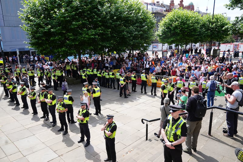 Heavy police presence as people protest outside Leeds Town Hall