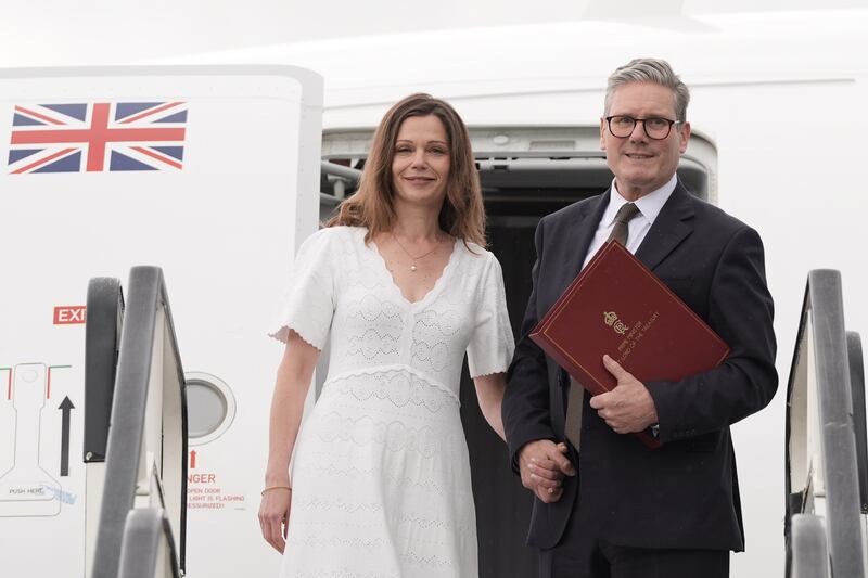 Prime Minister Sir Keir Starmer, pictured with his wife Victoria, has faced questions about Channel crossings while in Washington DC to attend a Nato summit