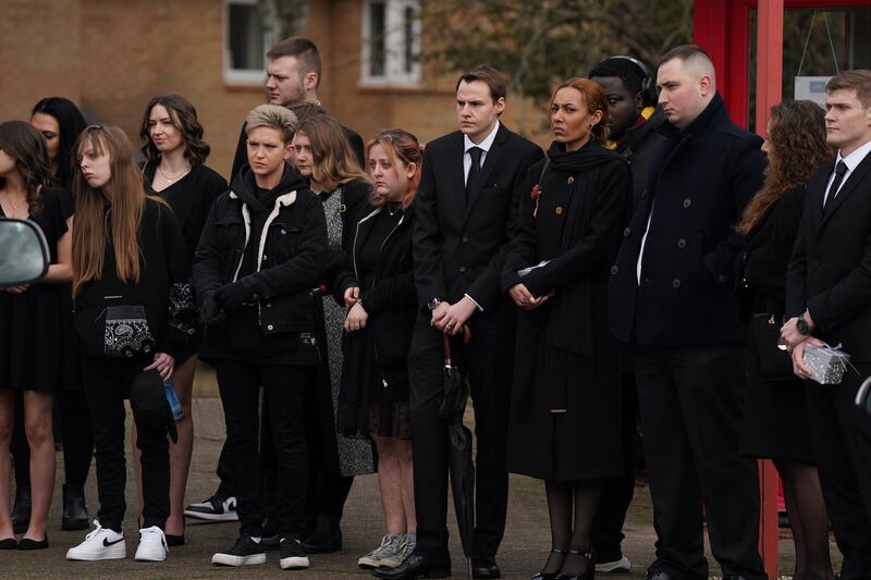 Mourners looked on as the funeral cortege for Ms Croucher made its way through Milton Keynes