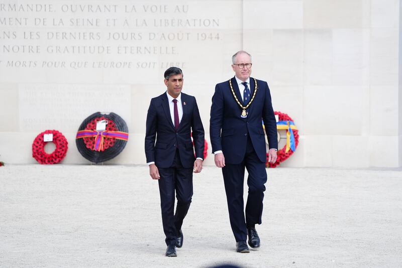 Prime Minister Rishi Sunak with National Chair, Royal British Legion, Jason Coward after laying wreath during the UK national commemorative event for the 80th anniversary of D-Day, held at the British Normandy Memorial in Ver-sur-Mer, Normandy, France