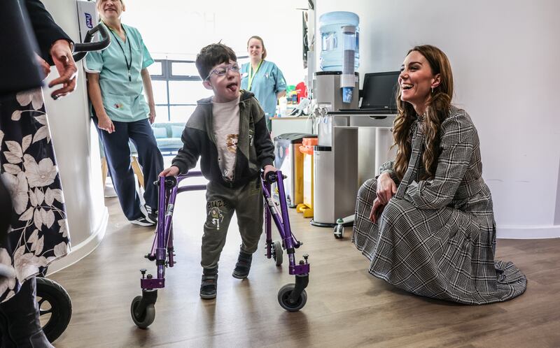 The Princess of Wales speaks to five-year-old Oscar, during a visit to the hospice in Sully, near Cardiff