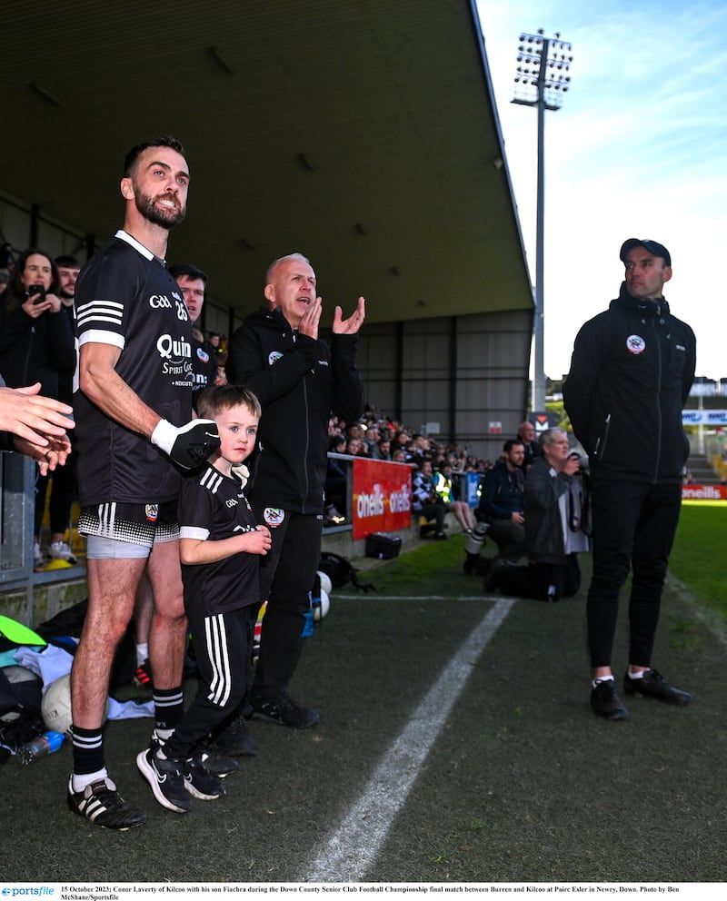 Kilcoo boss Karl Lacey (right) looks at player Conor Laverty (left) - who also happens to be the Down senior football manager.