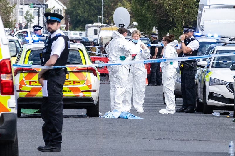 Police scenes-of-crime officers in Hart Street, Southport, after the incident