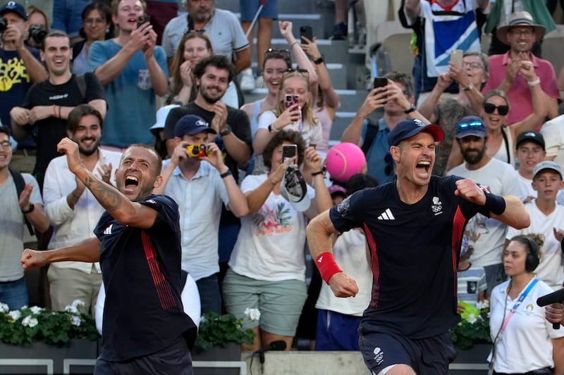 Andy Murray and Daniel Evans staged an extraordinary comeback to progress to the next round (Andy Wong/AP)