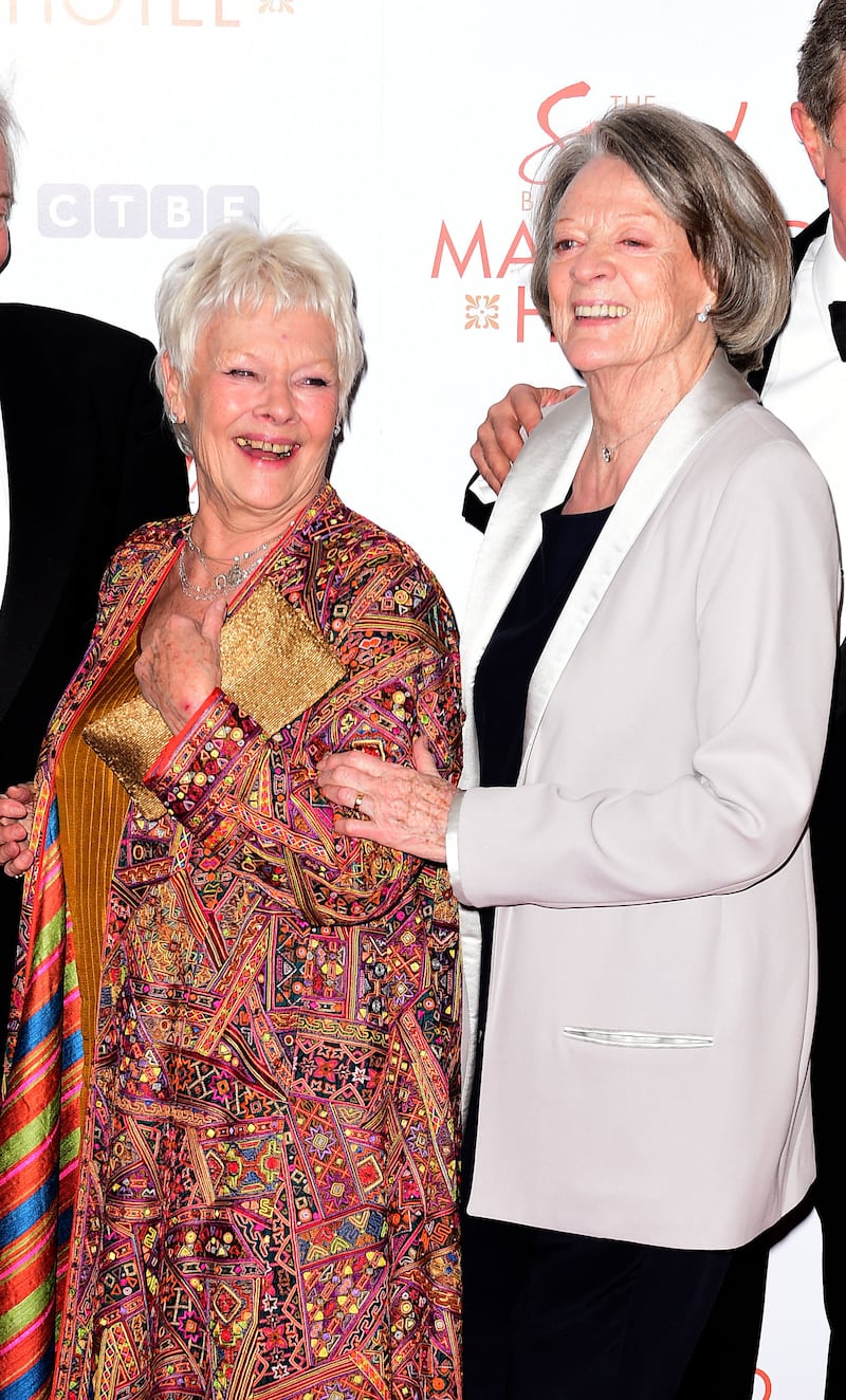 Dame Judi Dench, left, with Dame Maggie Smith at a premiere in 2015