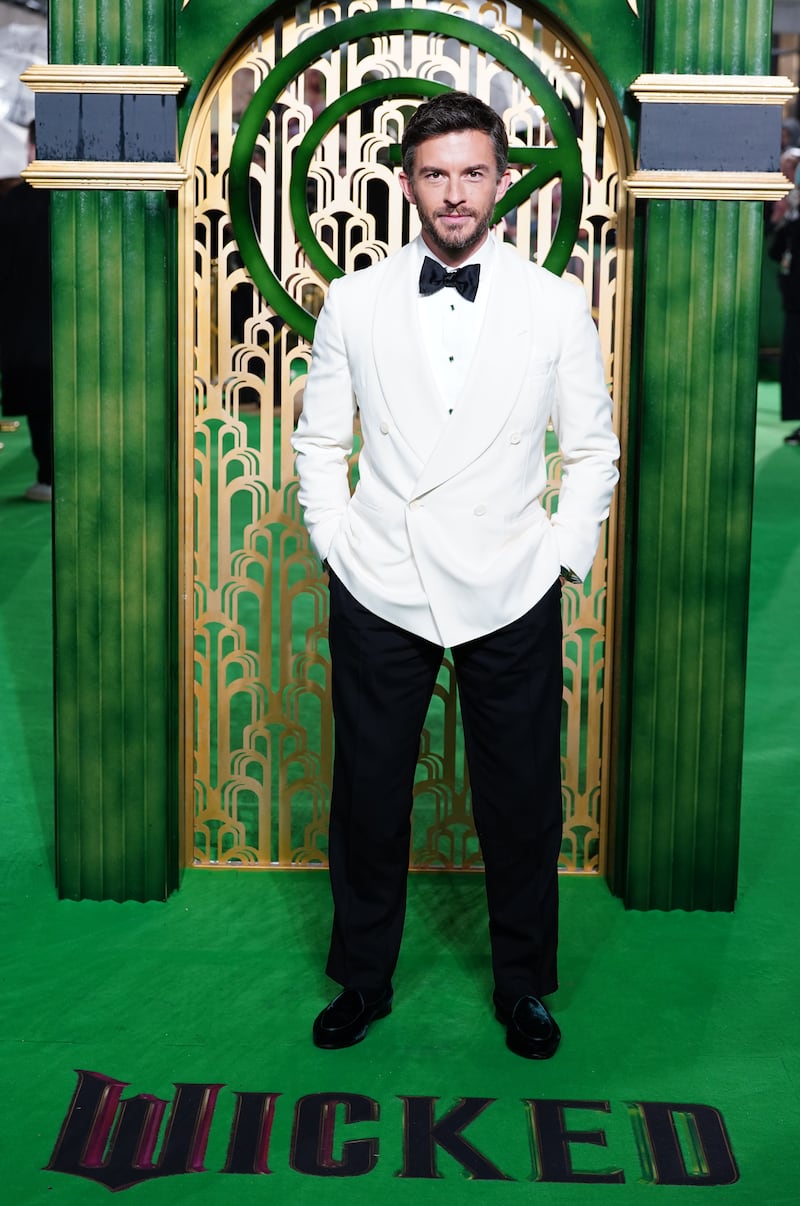 Jonathan Bailey channelled suave sophistication in a black and white tuxedo