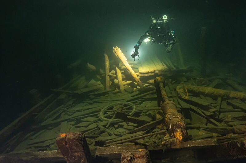 A diver from the Polish team inspects the wreckage (Marek Cacaj/Baltictech/AP)