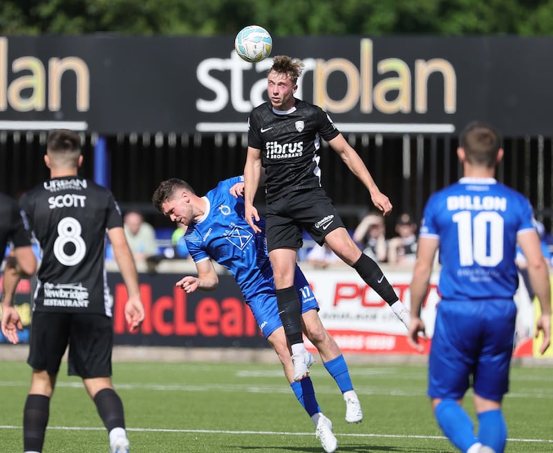 Pacemaker Press 10824
Dungannon v Coleraine  Sports Direct Premiership
Coleraine's Matthew Shevlin and Dungannon's Cahal McGinty during today's game at Stangmore Park, Dungannon.  Photo by David Maginnis/Pacemaker Press