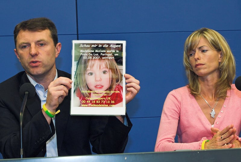 Gerry and Kate McCann with a picture of their missing daughter, Madeleine (AP Photo/Sven Kaestner, File)