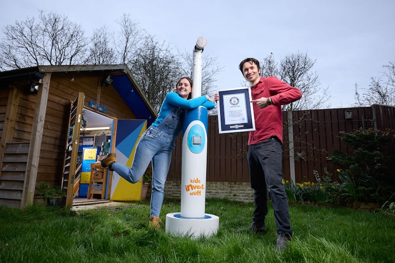 Ruth and Shawn created the giant toothbrush after a suggestion from George, 11 (Paul Hughes/Guinness World Records)