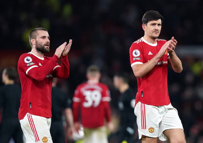 Manchester United defenders Luke Shaw (left) and Harry Maguire have both had fitness problems