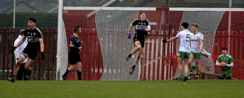 Dungiven&#39;s Odhran Murphy celebrates scoring a goal against Burren in the semi-final of the Ulster Minor Football Tournament at St Paul&#39;s GAC at the weekend. Picture: Seamus Loughran 