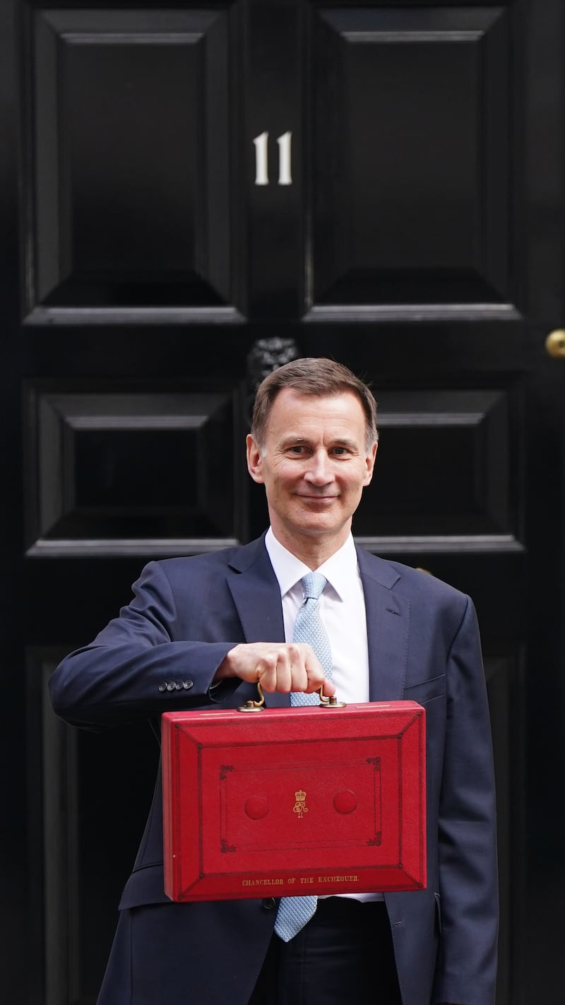 Chancellor of the Exchequer Jeremy Hunt leaves 11 Downing Street with his ministerial box before the 2024 Budget