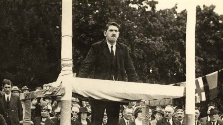 Michael Collins, speaking at Armagh in September 1921. The moustachioed figure on the bottom right of the picture is Peter Hughes, TD for Co Louth  (Courtesy Éamon Donnelly collection, Newry and Mourne Museum)