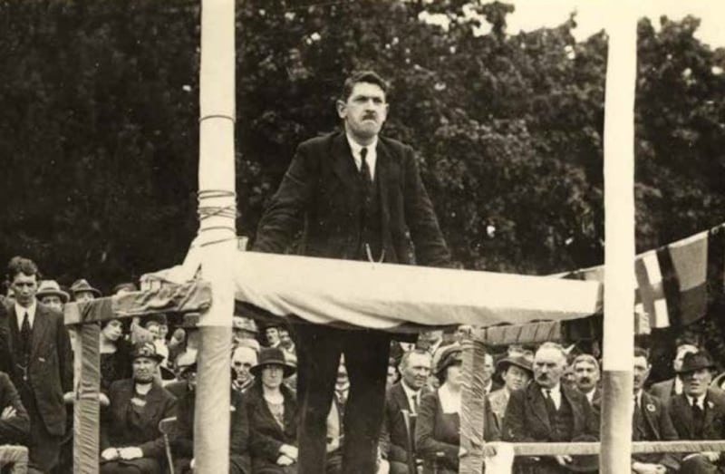 Michael Collins, speaking at Armagh in September 1921. The moustachioed figure on the bottom right of the picture is Peter Hughes, TD for Co Louth  (Courtesy Éamon Donnelly collection, Newry and Mourne Museum)