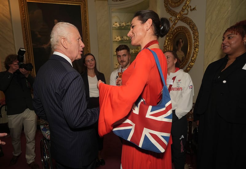 The King talking to Dame Sarah Storey