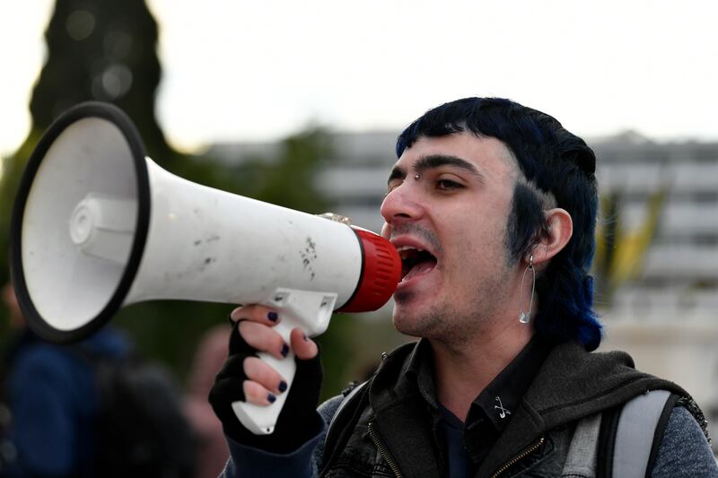 Supporters of the bill held small peaceful gatherings outside Parliament (AP Photo/Michael Varaklas)