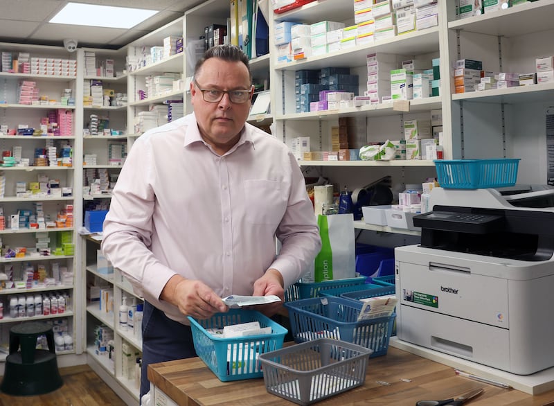 Pharmacy owner Paul McDonagh on the Falls Road in West Belfast speaks to The Irish News.
PICTURE COLM LENAGHAN