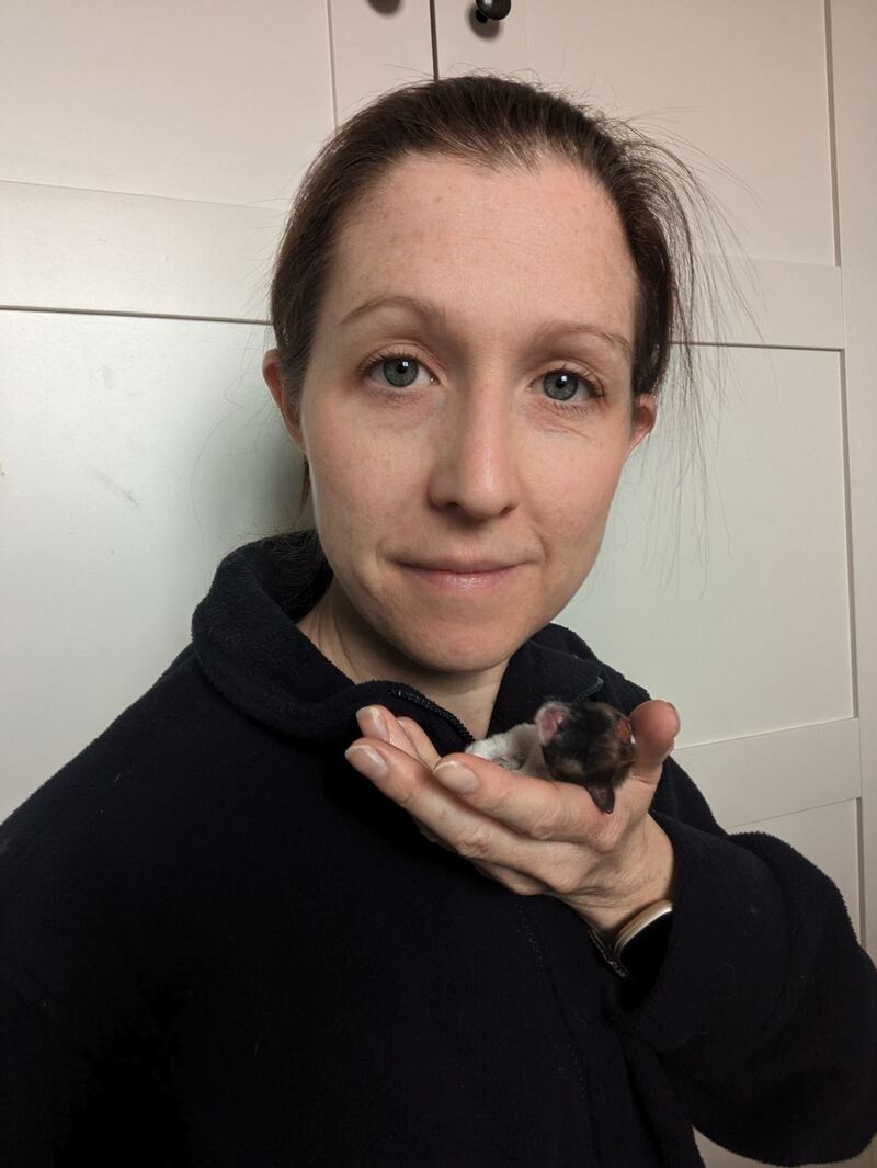 Puzzle and RSPCA inspector, Leanna Hone, who hand-reared the puppy.